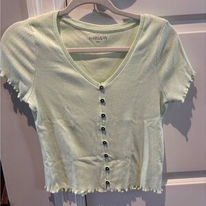 Green button T-shirt in great condition size medium